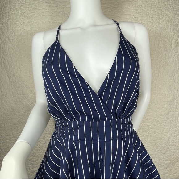 🔥Lulus Ruffle & Flow Black Striped Backless Ruffle
Romper Blue White - Picture 6 of 16